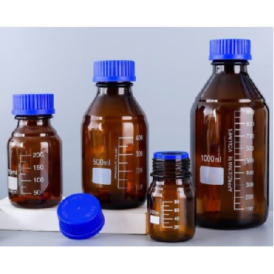 LABORATORY BOTTLE, AMBER GLASS WITH BLUE CAP - 250ML